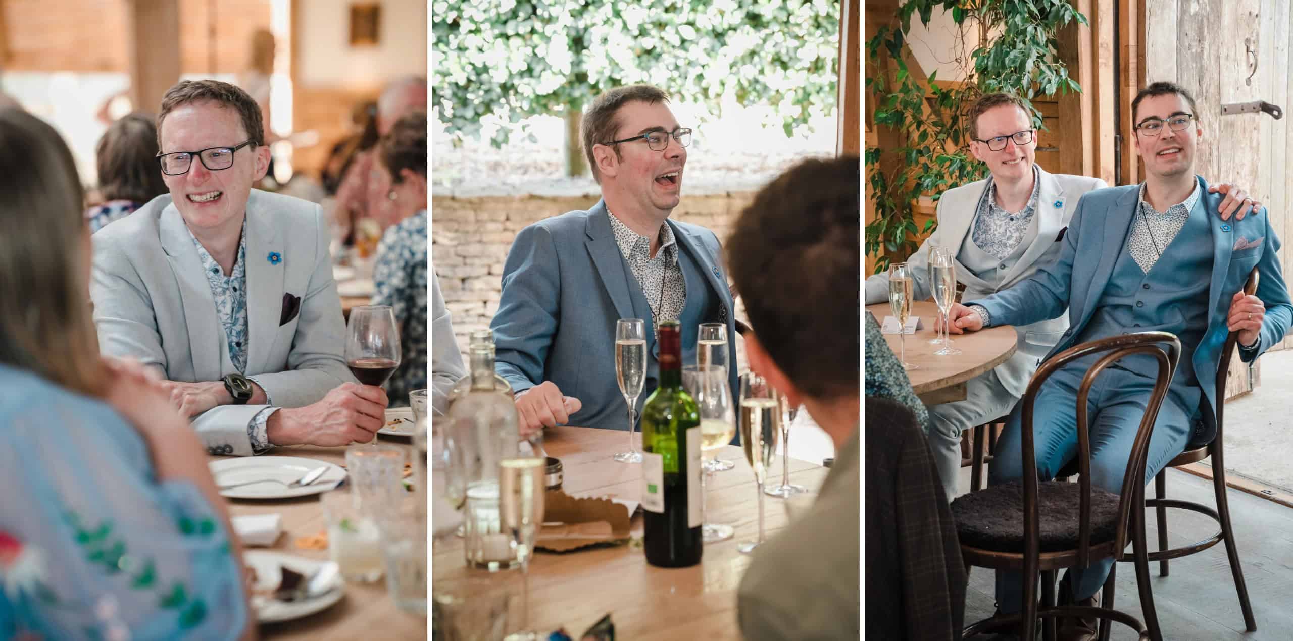 Man in light blazer smiling while conversing with a woman at a dining table during a social event. — Wedding at Cripps Barn, Cirencester